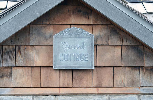 Guest Cottage Embossed Tin Sign General PPD